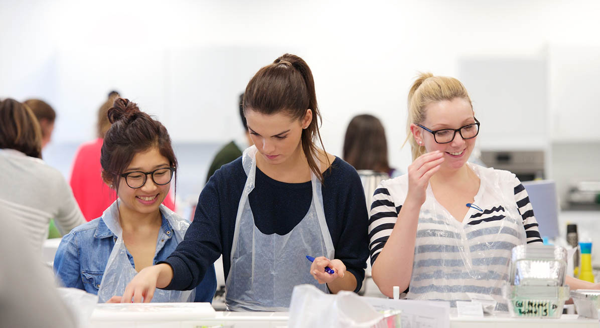 Students working in a food lab.